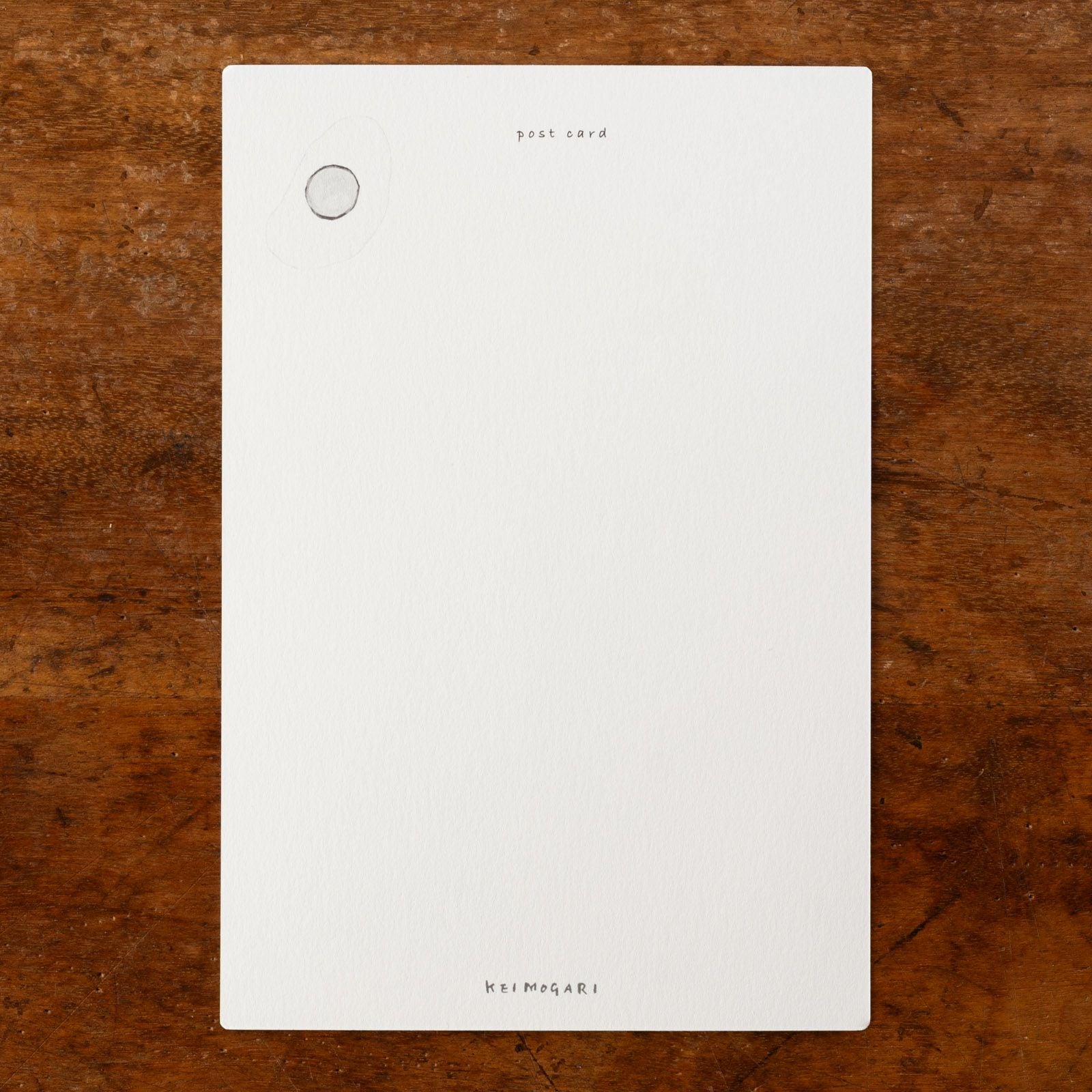 茂苅恵さんのフライパンと目玉焼きとねこのかわいいポストカードうら