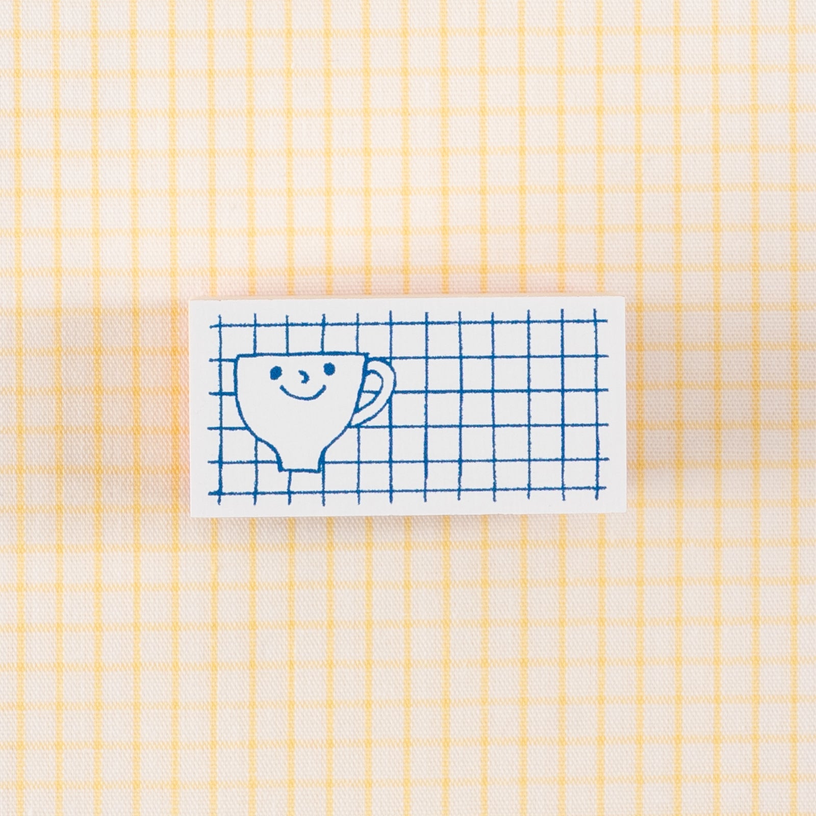 963hankoさんのマグカップとチェック柄が描かれたかわいいスタンプ